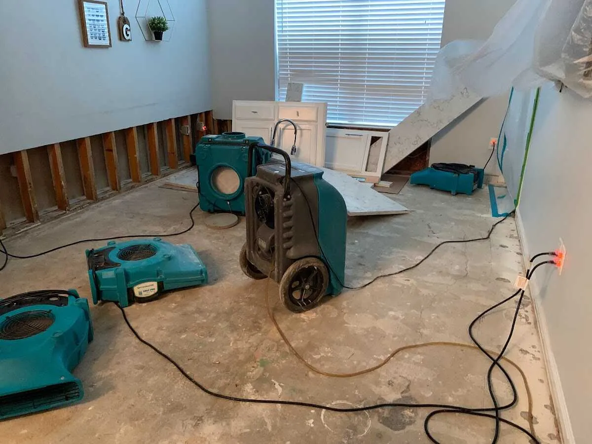 Dehumidifier in flood-cut room for Water Damage Restoration in Peninsula